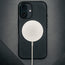 MagSafe charger connected to the Black Leather Slimline Bumper Case for iPhone 16
