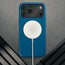 MagSafe charger attached to the Slimline Cobalt Blue Leather Bumper Case for iPhone 17 Pro