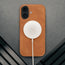 MagSafe charger attached ot the Tan Leather Bumper Case for iPhone 17