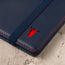 Close up of the TORTO bulls head logo on the front of the Navy Blue Leather (with Red Stitching) Passport holder