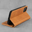 Stand function of the Tan Leather Stand Case for iPhone 11
