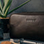 TORRO logo on the Dark Brown Leather Wash Bag
