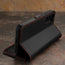 Stand function of the Black with Red Detail Leather Case for Galaxy S23+