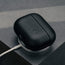 Black Leather AirPods Pro Case Cover (1st & 2nd Generation) on charger