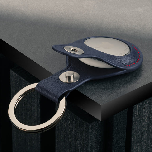 Close up of the Navy Blue with Red Detail Leather Apple AirTag Holder Keyring