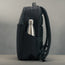 Side profile of the Black Classic Commuter Backpack with bottle pocket