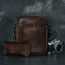 Dark Brown Leather Crossbody Shoulder Satchel Bag with items to show size and capacity