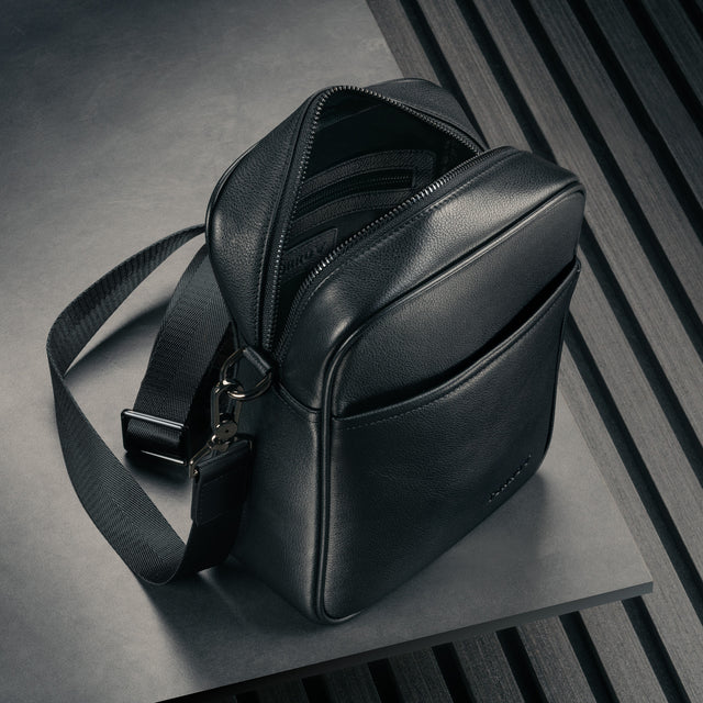 Storage pocket on the inside of the Black Leather Crossbody Shoulder Satchel Bag
