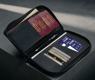 Black with Red Detail Family Travel Wallet with 4 passports, cards and travel documents