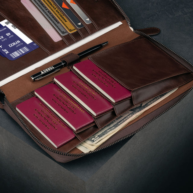 4 passports, cards and travel documents in the Dark Brown Family Travel Wallet