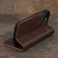 Integrated stand function of the Dark Brown Leather Wallet Case for iPhone 15 Plus