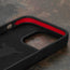 Geometric microfibre lined frame with advanced GEO-AS-3 protection of the Black with Red Detail Leather Bumper Case for iPhone 15 Pro