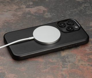 MagSafe Charger attached to the Black Slimline Leather Bumper Case for iPhone 15 Pro Max