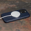 MagSafe charger attached to the Navy Blue Slimline Leather Bumper Case for iPhone 15 Pro Max