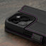 Camera cutout on the Black with Purple Detail Leather Wallet Case for iPhone 15 Pro Max