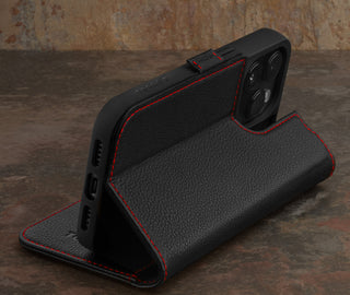 Integrated stand function of the Black with Red Detail Leather Wallet Case for iPhone 15 Pro Max