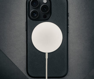 MagSafe charger on the Black Leather Slimline Bumper Case for iPhone 16 Pro Max