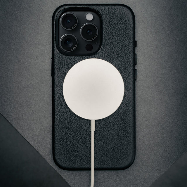 MagSafe charger on the Black Leather Slimline Bumper Case for iPhone 16 Pro