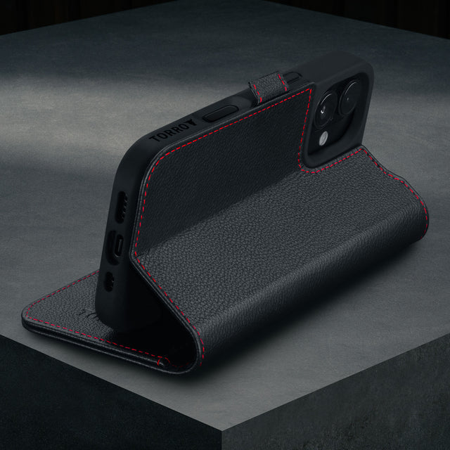 Stand function of the Black with Red Detail Leather Case for iPhone 16
