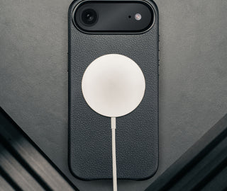 MagSafe charger attached to the Black Leather Bumper Case for iPhone 17 Air
