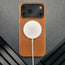 MagSafe charger attached to the Slimline Light Brown / Tan Leather Bumper Case for iPhone 17 Pro