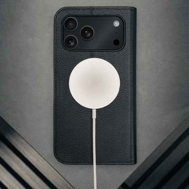 MagSafe charger attached to the Black Leather Case for iPhone 17 Pro Max