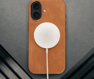 MagSafe charger attached ot the Tan Leather Bumper Case for iPhone 17