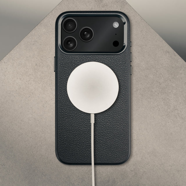 MagSafe charger attached to the Black Leather Bumper Case (with Camera Stand) for iPhone 18 / 17 Pro Max