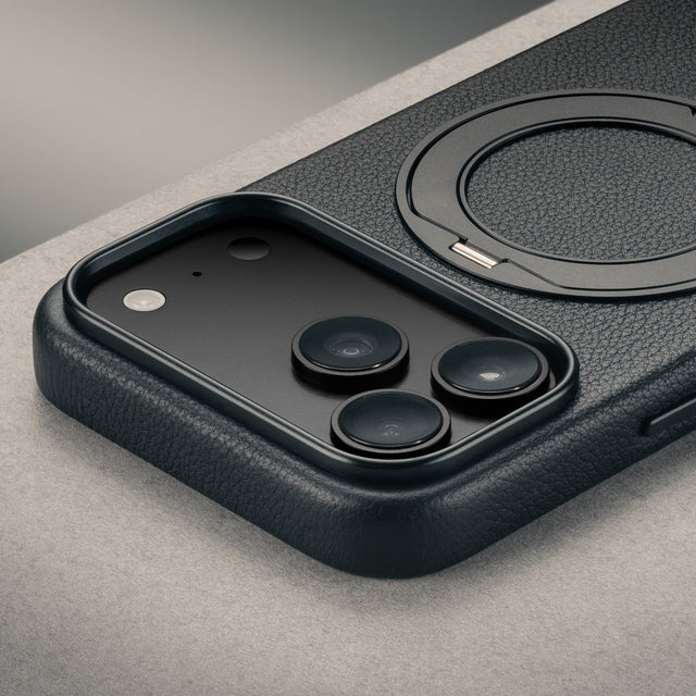 Camera cutout on the Black Leather Bumper Case with Rotating Stand for iPhone 17 Pro Max