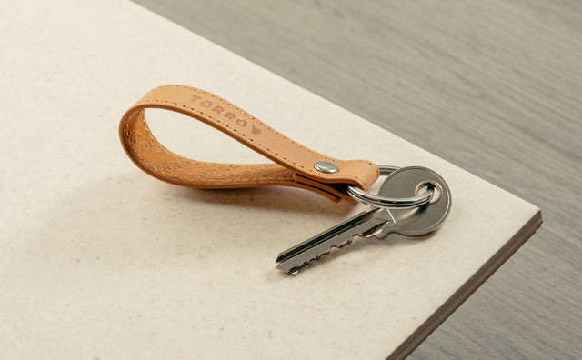 Tan leather keyring attached to key