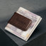 Dark Brown Leather Money Clip with bank notes