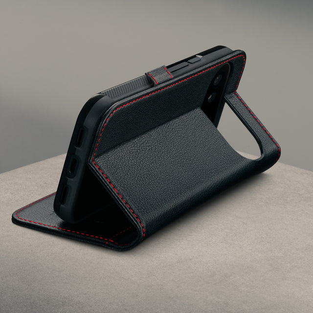 Stand function of the Black with Red Stitching Leather Case for the Google Pixel 11