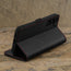 Stand function of the Black Leather with Red Detail Case for Galaxy S24 FE