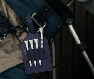 Navy Blue Leather Golf Tee Holder attached to golf bag