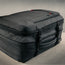 Showing the expandable section of the Black eith Red Detail Travel Backpack