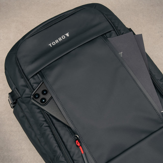 Smaller front pocket on the Black eith Red Detail Travel Backpack