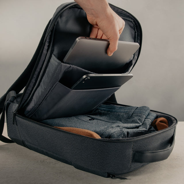 Grey Urban Commuter Backpack filled with clothes, ipad and laptop