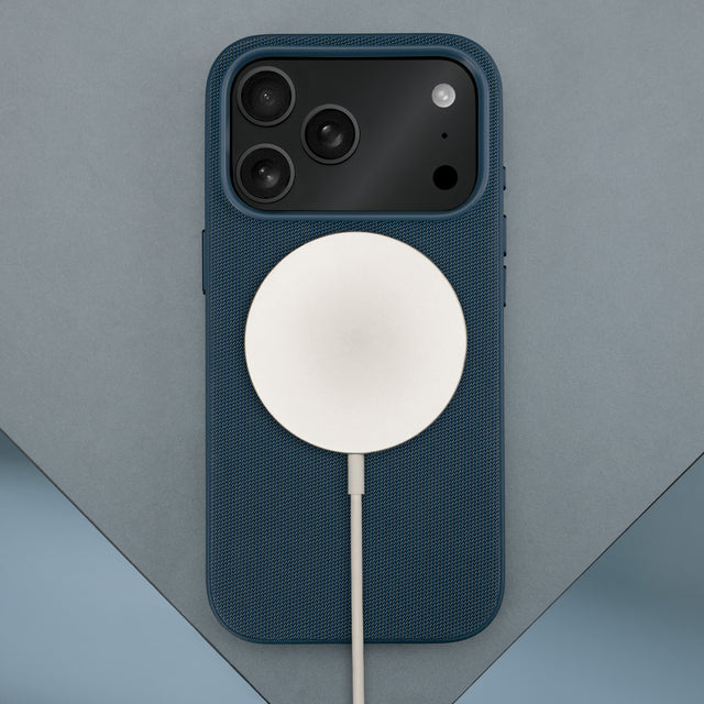 Wireless charger attached to the Blue Woven Texture Bumper Case for iPhone 17 Pro