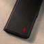 Close up of the TORRO logo on the Black with Red Detail Leather Case for Galaxy S21 Ultra