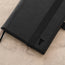 Close up of the front cover of the Black Leather A4 Notebook Cover