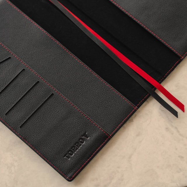 Close up of the inside cover of the Black Leather (with Red Stitching) A4/A5 Notebook Cover