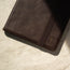 TORRO logo to the front of the Dark Brown Leather Stand Case for iPad 10.2