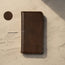 Highlighting the genuine leather material of the Dark Brown leather stand case for Apple iPhone XS / X