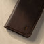TORRO logo to the front of the Dark Brown Leather Stand Case for iPhone XS / X
