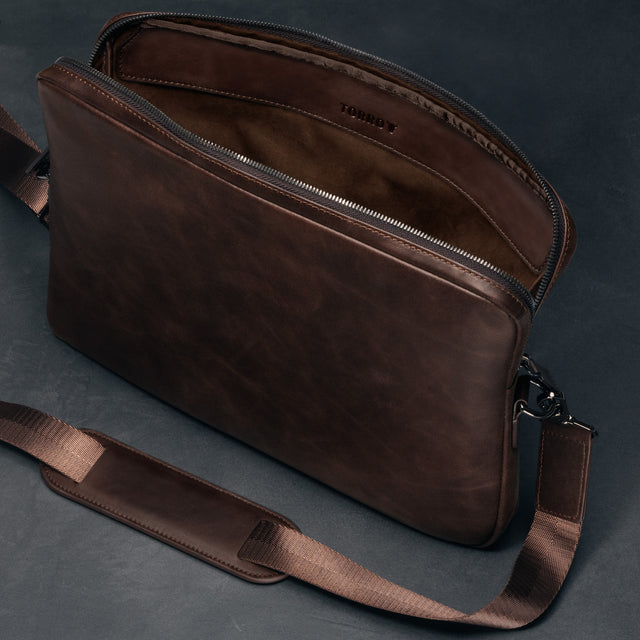 Inner protective flap in the Dark Brown Leather Messenger Bag