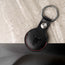 Back of the Black with Red Detail Leather Apple AirTag Holder Keyring showing the TORRO bulls head logo