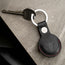Black with Red Detail Leather Apple AirTag Holder Keyring attached to key