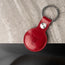 Back of the Red Leather Apple AirTag Holder Keyring showing TORRO bulls head logo