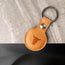 Back of the Tan Leather Apple AirTag Holder Keyring showing TORRO bulls head logo