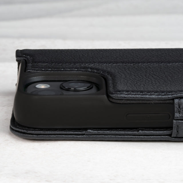 Raised camera lip (for added protection) on the Black Leather Folio Stand Case for iPhone 14
